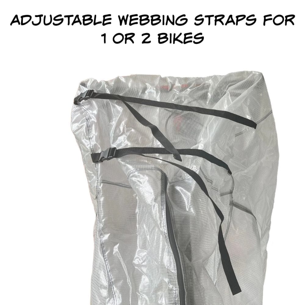 Clear bike cover with adjustable webbing straps on a white background