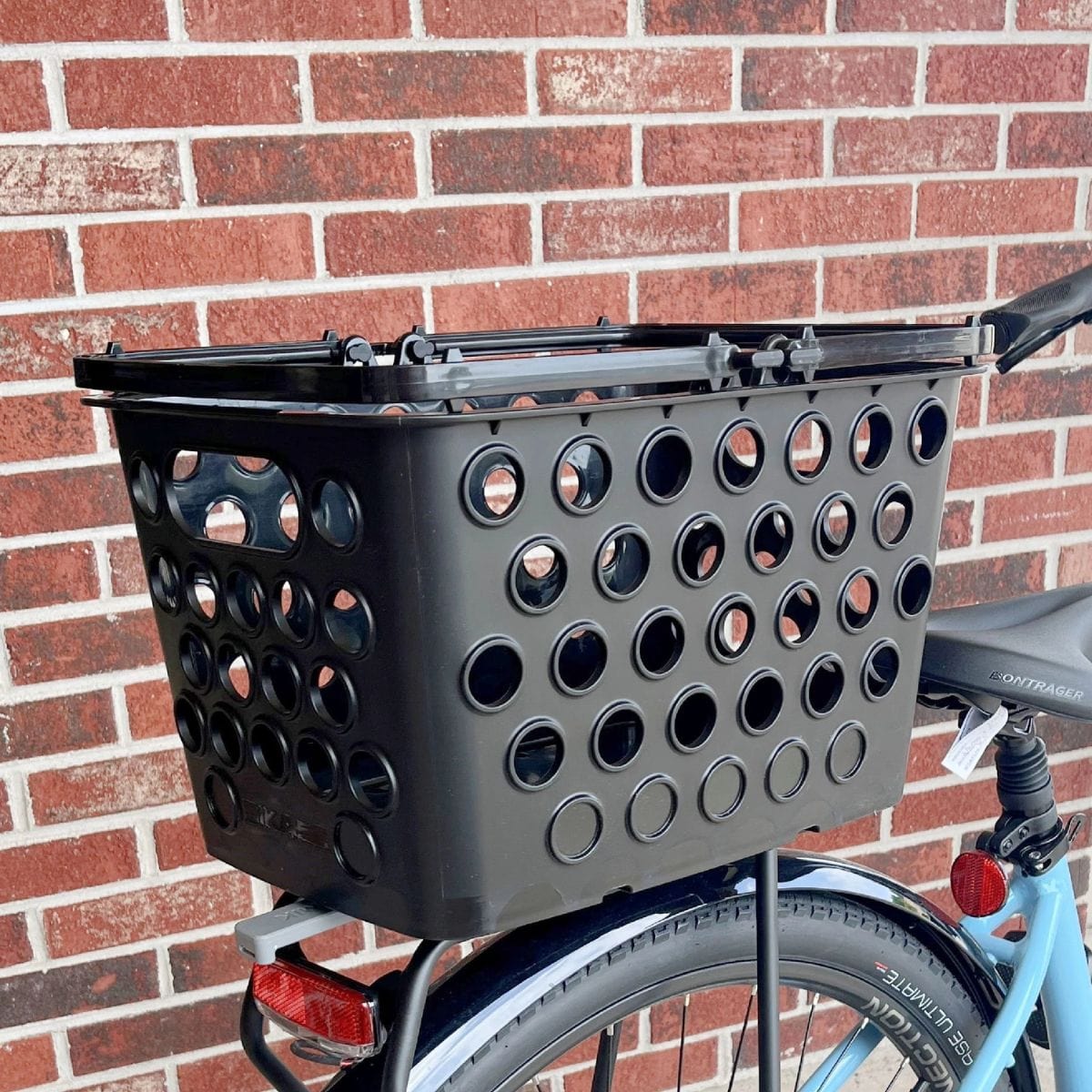 For rear attachment to bike racks choose MIK mounting or rubber straps