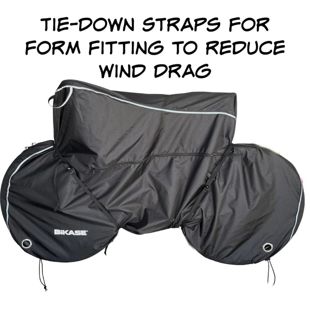 Black bike cover with tie-down straps for reducing wind drag, featuring the BIKASE brand.
