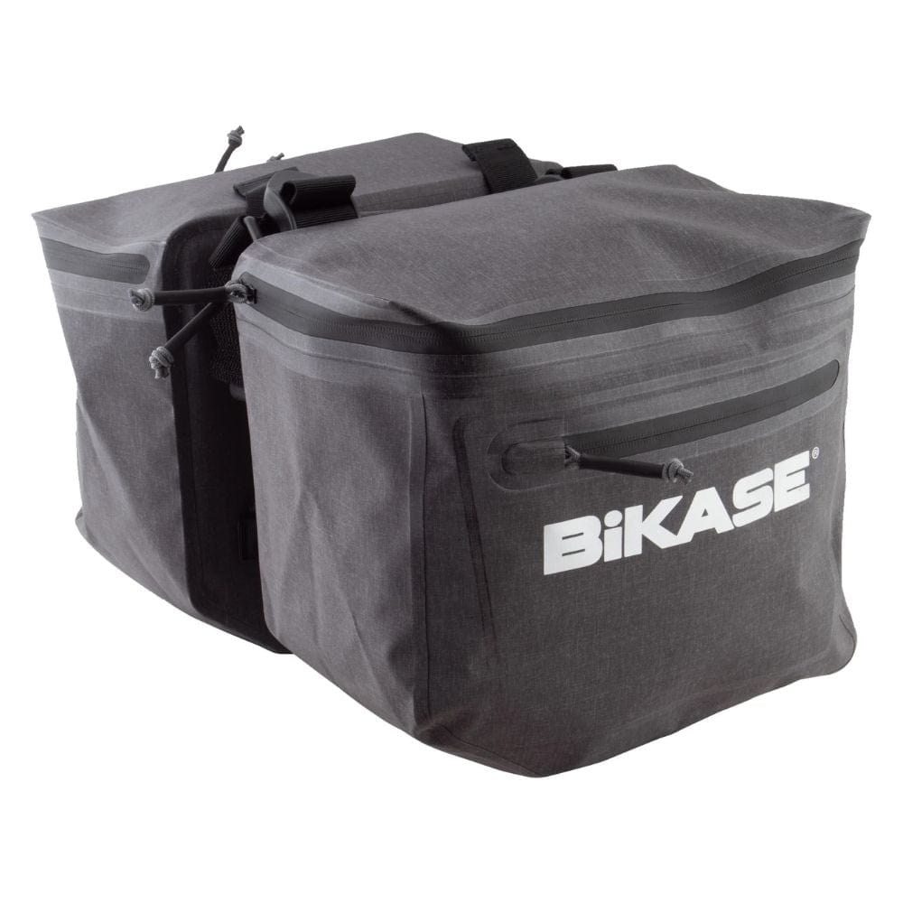 Gray bicycle pannier bag with 'Bikase' branding on a white background